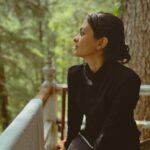 Solanki Roy Instagram - Being amidst the mountains has always made my heart feel a certain way which nothing else could. The silence, the tranquility of the mountains almost deafens me and the grandeur never fails to leave me in awe. In the morning, as the leaves sing a ballad, i sit on my little balcony in a heritage tree house, completely immersed. I see the cloudscape change, hear the birds chirp, feel the warmth of the sun on my shoulders, and smell the air. The smell of the forest is very unique, wild and masked. It always stir up memories, familiar, yet unknown to me. The mountains are believed to hold the earth's deepest secrets, the lores from times unrevealed to mankind. I realised, I don't wish to know. I want to keep the magic alive, i want the mystery to stay! As I sat there, I slowly lost the sense of me, and as I was losing the sense of me, I found myself. "And I think to myself, what a wonderful world"
