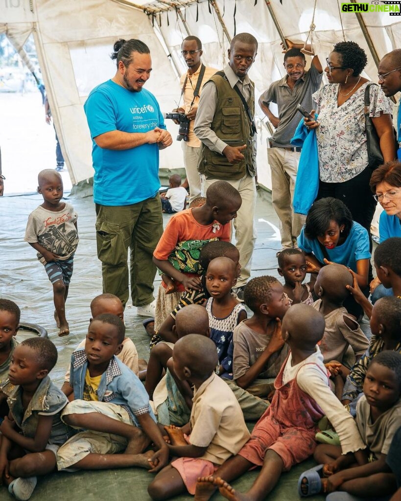 Adam Liaw Instagram - This is the UNICEF-supported #GreenGirls initiative where young women from #Sobel produce ecological charcoal from collected waste. We often think of the effects of climate change first impacting low-lying island nations, but #Sobel is a camp for more than 6000 Burundians who have been displaced because of extreme flooding caused by climate change. Climate change is already having a big impact on Burundi, from increasing frequency of extreme weather events like flooding, to decreased agricultural yields caused by prolonged rainy seasons. The Green Girls program an ingenious multi-dimensional solution to may of the problems facing these climate refugees. Firewood collection is a task usually performed by young women, who may have to walk for hours to find appropriate firewood. This exposes them to a high risk of sexual assault, and firewood collection contributes to deforestation. By producing ecological charcoal the girls don’t have to search for firewood, protecting them from potential assaults, and it also reduces deforestation and provides them with an additional source of income from the sale of surplus charcoal. An ingenious solution to a multi-dimensional problem. It was fabulous to see this initiative first-hand, chat with the girls and play with many of the kids from Sobel.