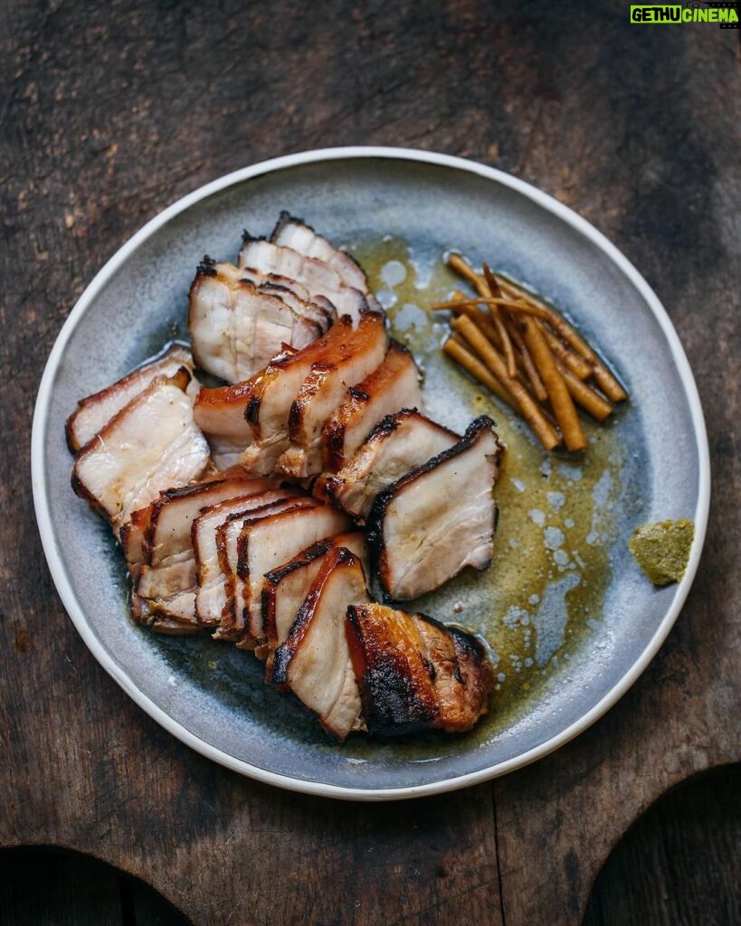 Adam Liaw Instagram - Tonight’s dinner. Misozuke grilled pork belly with yuzu kosho and pickled burdock. Pork belly cured for a day in brown rice miso and ginger, the roasted slowly on the barbecue for about half an hour