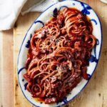 Adam Liaw Instagram - If you’re looking for Thursday night dinner inspo, you could do a lot worse than this tomato and red wine spaghetti from the Thursday Night Pasta chapter of 7 Days of Dinner. Spaghetti finished in a tomato and red wine base with crisp pancetta and a good amount of parmesan. A super quick dish with lots of flavour.