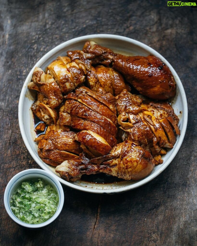 Adam Liaw Instagram - Tonight’s dinner. Soy sauce chicken with ginger and spring onion oil. I haven’t made lo sui (sometimes called “master stock” in English but the literal translation is “old water” 😂) in a while but I’ll boil and freeze this stock now for a few repeat performances. The stock is water, homemade wine, onion, garlic, ginger, sugar, anise, black cardamom, chuan xiong, cinnamon, etc.) and the chicken marylands simmer at very, very low heat for 45 minutes.