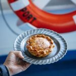 Adam Liaw Instagram - Sauce or no sauce? Poh and I made pies and sauce for the folks on board the @spiritoftas and I’m honestly shocked at how sauce with a pie could even be controversial but apparently it is. You can find our trip, and Poh’s Beer-braised beef pie with cheddar crust, or my Red wine and tomato sauce on episode 5 of #AdamandPoh’s Great Australian Bites on @sbsondemand. Well, do you have sauce with a pie or not? #spiritoftasmania #spiritedtraveller