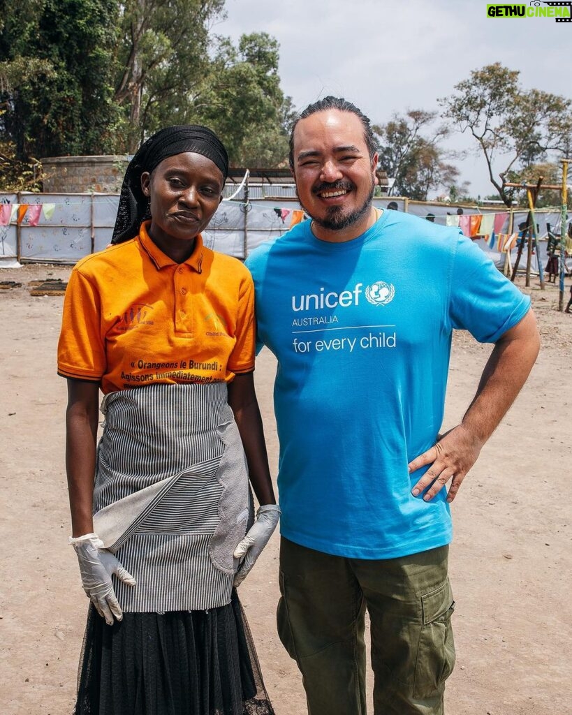 Adam Liaw Instagram - This is the UNICEF-supported #GreenGirls initiative where young women from #Sobel produce ecological charcoal from collected waste. We often think of the effects of climate change first impacting low-lying island nations, but #Sobel is a camp for more than 6000 Burundians who have been displaced because of extreme flooding caused by climate change. Climate change is already having a big impact on Burundi, from increasing frequency of extreme weather events like flooding, to decreased agricultural yields caused by prolonged rainy seasons. The Green Girls program an ingenious multi-dimensional solution to may of the problems facing these climate refugees. Firewood collection is a task usually performed by young women, who may have to walk for hours to find appropriate firewood. This exposes them to a high risk of sexual assault, and firewood collection contributes to deforestation. By producing ecological charcoal the girls don’t have to search for firewood, protecting them from potential assaults, and it also reduces deforestation and provides them with an additional source of income from the sale of surplus charcoal. An ingenious solution to a multi-dimensional problem. It was fabulous to see this initiative first-hand, chat with the girls and play with many of the kids from Sobel.