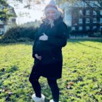 Ali Bastian Instagram - 30 weeks today!! 🤰🏼 #bumpdate Feeling ready to fully enter hibernation mode, especially with this cold weather - two year old has other ideas! In some ways it’s probably not the worst thing that she is helping me stay reasonably active. I’m still managing my Gestational Diabetes with diet - although never sure how long that will be for - I’m trying to not be too attached to the idea I can ‘control’ it and accept that if I need medication then that’s what I will do to keep me and bubba safe. Keeping moving more than I did in first pregnancy has got to be a good thing though! It’s hard to not be able to eat what I feel like - which honestly, most of the time is cake!! I miiiisssss caaaake!! And chocolate and crisps and did I mention cake??? Also top tip for anyone else preggo in this cold weather.. @seraphinematernity do this fleece lined set of thermals that I got a few weeks back when I was filming outside all day! 🎬❤️And their 3 in 1 Maternity to baby wearing parka is a faux fur lined dream that comes with an extra panel for baby wearing with a little hood. I was a big baby wearer with Isla and really hope to carry our new bubba! Swipe for frosty photo dump! 💜 #thirdtrimester #pregnancy #bump #gift