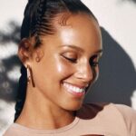 Alicia Keys Instagram - I’m so excited to introduce you to “It’s Like Skin” skin tint. This offering has been my go-to everyday skincare color-hybrid, even on tour where I do my own makeup for each show. Applying this light, nourishing formula is the secret to my glow. Creating offerings that makes our skin feel safe and protected is what matters most to me💜 I know we all have a skin story or experience that has opened our eyes to who we are and who we want to be. I’d love to hear yours! I can’t wait for you to try “It’s Like Skin” a buildable 2 in 1 skin tint + concealer in 40 different shades for every beautiful you! 😘 @keyssoulcare