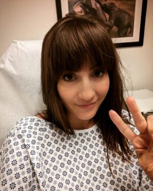 Alison Haislip Instagram - Hey. Here's your reminder to see a dermatologist once a year to get all your awesome moles and freckles checked to make sure they haven't turned mean and cancerous. Then maybe you too can take a doctor's office selfie with a framed picture of delightful muddy elephants behind you.

#skincare 
#dermatologist 
#delightfulmuddyelephants