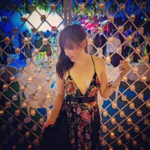 Alison Haislip Instagram - HUGE thank you to @cel.sell & @audrhi for finding me this STUNNING dress for an outdoor black tie Mexican wedding. I've never felt more perfectly attired for a special occasion. 🩷🖤💜❤️

It also stayed perfectly in place even after all the tequila...for the most part. 🍹