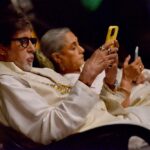 Amitabh Bachchan Instagram – Parents at work on shooting set .. as lights camera get ready 😂😂😂🤣 favourite pastime