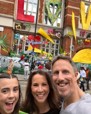 Andrea McLean Instagram - 4 things I did this week to fill my cup that had nothing to do with work:
1. My friend Andy popped in while passing through. He lives a long way away so we don’t see much of each other. It’s weird to think we first met at school 36 years ago - how in earth did THAT HAPPEN??!! It was nice to catch up. 
2. Mr F and I went for a long dog walk which culminated in an unplanned glass or two of rosé and dinner outside in the sunshine. I’m glad we did it as it feels like we caught the last bit of summer.
3. I chatted to my son Fin on the phone for two and a half hours. It’s been a bumpy few years while he’s been away at uni (any parents of kids who started during Covid know what I mean). We caught up on all sorts of things - films, telly, books, psychology, theology… I think we covered it all! This was a snap I sent him mid chat to show him my view of Teddy.
4. We went to Notting Hill Carnival today! Growing up in Trinidad means it’s always pretty special. We got there early, I had my curry and roti, we chipped along behind a few bands then we headed home before it got even busier. It was Amy’s first time - I was around her age when I last went to Carnival in Trinidad, which is a strange thought! This week seems to be a reminder about all the changes that have happened in my past and present… an unexpected reflection.
#4things