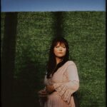 Angel Olsen Instagram - I recorded my version of “Greenville” by Lucinda Williams with Kyle Thomas @kingtuffy a few summers ago. We’d always run in the same circles and I’d never worked with him on music before but it was honestly the best chill time. I asked Meg Duffy @hand.habits to sing with me on the track because they were the one to remind me of Lucinda’s work during the beginning of the pandemic and now it’s one of my favorite songs to sing live or in the car, whichever. I love how Lucinda Williams cuts through to the heart with a casual turn of a phrase, and this is one of my favorites, I hope you enjoy. It’s now streaming everywhere. Photo 1 by @shervinfoto