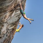 Angie Scarth-Johnson Instagram - Learning from the master🥷🏻.. To put into words what’s happening here; @chris_sharma guides me alongside the rock face. My first real deep water solo experience, he then looks at me half way up the wall and says 🥷🏻: “ok , looks like we’re lost, your on your own now” He proceeds to fearlessly navigate his way up the wall above a breathing ocean. .. I look down at the shark infested Mediterranean waters beneath me, I look over at chris , he’s having a blast. me? Probably a small panic attack. First day best day. 🥹 Photo 1: @giancolafoto @redbullau @climbing_anchors @thenorthface_aunz @tenayaclimbing @camp1889 @mytendon @cvok9c @climbersagainstcancerofficial @climbskinspain @frictionlabs #neverstopexploring #tenayaclimbing #climbinginspain #womanclimbers #climbskin #chalkupless #newstandardinchalk #climbinganchors Mallorca