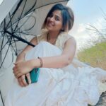 Anjali Instagram - A girl with no name 💫 #yezhukadalyezhumalai #7k7m #directorram #in #between #shoot #actorslife #nature #girl #with #umbrella #somewhere