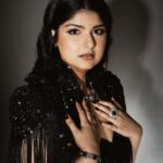 Anshula Kapoor Instagram - For a girl who has always been bigger than most, who’s insecure of her soft belly, and her back rolls, A sari has never been my go to Indian silhouette. And a sleeveles corset? Absolutely not! My first thought would be “I won’t find one In my size” or “it will squeeze the life out of me”. But 2024 is the year of being fearless 🙃. So when @shereenlovebug and @meghnadhall came over with this gorgeous black beaded corset sari with a cape, how could I let my insecurities for something that’s actually human and normal (and dare I say feminine) stop me from wearing the most gorgeous corset sari I’ve ever laid my eyes on? Most importantly, this is the most comfortable corset I’ve ever worn, and yes I didn’t think I would say those 2 words together ever, but that’s the magic of @meghnadhall When 2 fears come together, but it makes me feel fiercely beautiful instead of scared and conscious of my body, I call that a victory. One that can only be attributed to the best team ✨ Styled by @shereenlovebug with @⁨meghnadhall⁩ Style team - @snehhasuresh @salonitandel_ Makeup - @divyashetty_ Hair - @ruchithakur.5 Photographed by - @visualaffairs_va Sari - @meghnadhall Jewels - @amrapalijewels Bag - @bottegavenetaworld Footwear- @zara Thank you @shereenlovebug for making me jump out my comfort zone every single time. Even if it’s in black 🤓🖤