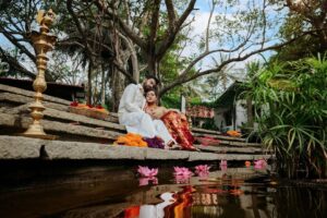 Arjun Kamath Instagram - Unbound laughter, graceful moments of love, and the sublime beauty of nature. I had the perfect elixir to craft the prewedding portraits of Sharadh and Sharayu, two jovial folks who could light up any room they walked into. 

The gentle morning sun was by our side as we strolled the verdant milieus of Tamarind Tree, Bengaluru. Whiffs of crisp air enchanted us, fragrant with the scent of fresh flowers and mud. Accompanying us were tiny colourful birds and the golden rays of the sun, as we explored the little green pockets of serenity around us.

That morning, Sharadh and Sharayu had arrived in an adorable lighthearted spirit. Their traditional attires of red and white complemented the earthy tones of Tamarind Tree, and their radiant smiles did the rest of the trick. We spent the next few hours immersed in sweet laughter and love, as I pictured them in all their beauty and grace. I still remember the precious look in their eyes and the warmth they shared with each other. 

Perhaps that gives these photographs the special place they have in my heart. That I collected all the love, light, and laughter from those moments and gave them to the couple to cherish forever.

#CapturedOnCanon with a @canonindia_official EOS R5 with a CanonRF 24-70 f/2.8 L USM 

#preweddingshoot #indian #couple #love #laughter #preweddingphotography #prewedding #indianwear #indianphotography #indianfashion #saree #sareelove #flowers #sunrise #arjunkamathphotography #bangalore #DoGreatWithCanon #MentorsInFocus #EOSMaestro #instagood #instagram