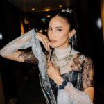 Aulia Sarah Instagram - Stepping into 'The Marvels' premiere as Monica Rambeau, blending elegance with super power. @marvelindonesia @disneyindonesia Designer: @jeantirtamarta Concept Styling: @jonathandytan Make Up: @ms_lifa Hair: @ade_ragil_hairdo Accessories: @tuloladesigns @naula_studio @gelap.ruangjiwa
