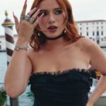 Bella Thorne Instagram - Vintage Dior by John Galliano and @amfar make a great pair 🖤🤓 @dior @jgalliano @cartier @thornedynasty