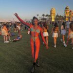 Bethany Clayton Instagram - She is the moment ⚡️ styled by @charlessuxx ❤️‍🔥 Dress @jeanpaulgaultier Shoes @jeffreycampbell Bag @diesel Coachella Music Festival