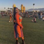Bethany Clayton Instagram - She is the moment ⚡️ styled by @charlessuxx ❤️‍🔥 Dress @jeanpaulgaultier Shoes @jeffreycampbell Bag @diesel Coachella Music Festival