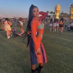 Bethany Clayton Instagram - She is the moment ⚡️ styled by @charlessuxx ❤️‍🔥 Dress @jeanpaulgaultier Shoes @jeffreycampbell Bag @diesel Coachella Music Festival
