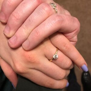 Brennan Lee Mulligan Instagram - True Story: Immediately following my proposal, the one and only Izzy Roland, never to be outdone, wordlessly bolted from her chair and sprinted down the hall, leaving me on bended knee while she recovered a silver Claddagh ring from its hiding place of several months. A counter-proposal for the ages, and I cannot wait until the day I get to turn this ring around. Love you with all my heart, @iz_ball! 🥰
