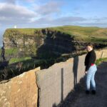 Brennan Lee Mulligan Instagram - Much, much #latergram of me and @iz_ball’s incredible time in Ireland: Cliffs of Moher, Fairy Bridges & Wishing Chair, Giant’s Causeway, Dunluce Castle, full Irish breakfast courtesy of Iz, fabulous night at O’Donoghue’s in Dublin with the wonderful @mr_lukebenson & @kathyroseobrien (including photo evidence of our best “scrieobs”) and a quick musical breakdown on one of many McVitie’s snack runs. So much more not pictured but fondly remembered! Incredible trad music festival in Ennis, hedgerow labyrinths in Clare, unreal fish & chips in Howth, and gorgeous Galway City. A perfect trip! 🇮🇪☘️🥰