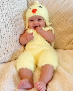Brittany Daniel Instagram - Happy Easter from our new little chick Hope Rose Touni. 🐣 @adam.touni #Happy Easter