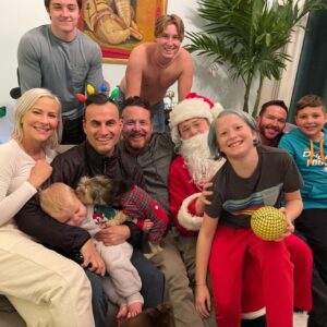 Brittany Daniel Instagram - Merry Christmas from our wild and wonderful family. Being with you all made my year and having our baby Hope is the most special present ever. We love you Hope. @adam.touni #merrychristmas