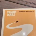 Bruno Mars Instagram - When "Doo Wops and Hooligans" came out "Just The Way You Are" had just gone #1. So when the album initially sold poorly, it was considered a flop. But we kept fighting, pushing and performing. Now thanks to you, Doo Wops is the longest charting debut album ever and has sold over 14 million copies worldwide. There’s your proof that life is a marathon, not a race. As an amazing cherry on top, "Grenade" went diamond just the other day, which makes two diamond singles on the same album. So today we celebrate. To all the Hooligans, thank you for changing my life. I pray we'll all be dancing together real soon. Sincerely, Double Diamond Brunz 😎🥂#doowopsandhooligans #10yearanniversary 🚀🚀🚀
