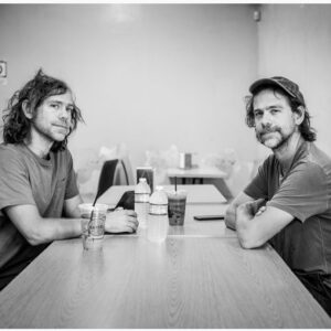 Bryce Dessner Instagram - Happy birthday to my beautiful talented brother @aarondessner forty-four years today of sharing our birthday and this year even though we are separated by an ocean and closed borders I know someday before too long we will find each other. Right now those endless hours of sitting together backstage on show days (as we are in this photo) seem like some kind of lost paradise. Love you brother.  thanks for the photo @grahammacindoe @straightxnarrow