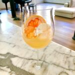 Casey Patterson Instagram - Back at it 🥂 Sunny spring cocktails. Homemade Jasmine tea and orange blossom honey simple syrup ~ Dom Perignon ~ pink grapefruit garnish. Floral, citrus champagne cocktail. What should we name it? Soho