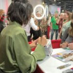Catherine Bell Instagram - Fangirl moment!!! Mr. Chevy Chase! And so many other great people I’ve had a chance to meet here! ❤️🎄🫶🏼 #christmascon2023 @thats4ent ❤️ And yes that’s a custom made Pop! Bobble head Cassie doll!! 🤯😍