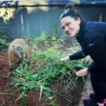Chrissie Swan Instagram - Take a break from obsessing about @taylorswift for just one RED second and enjoy this pic of me feeding bamboo to a capybara @tarongazoo … We ride tomorrow, Swifties! ❤️