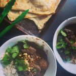 Chrissie Swan Instagram - One night in San Francisco, Leo and I had been out gallivanting and it was suddenly freezing cold and we were starving. We walked into @kinkhao and had the best Beef Massaman of our LIVES. Since then Leo’s been gently suggesting I try my hand at it but I was nervous because the one we had was PERFECT. Anyway - I *did* accept the challenge and it took 450 hours and every pan in my kitchen BUT it was absolutely sublime. It’s the Beef Massaman recipe from @recipe_tin - I think it might be in Nagi’s amazing cookbook called Dinner as well - anyway - WELL worth the effort but I literally did it over 3 days 😳. (Roti is store-bought from @nickandsuesgourmetdeli ) Swipe for photo of my kitchen post-cook. 🤗