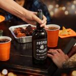 Conor McGregor Instagram - Whether out on the town, at the local, or home with your mates—’tis a rich and smooth season to #PourTheRoar. Pick up a bottle or two of Proper No. Twelve today for all your holiday festivities. 🥃🎁