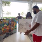 DJ Khaled Instagram - Bless up the beautiful people and island of RIHADOS 🇧🇧 my family and I had the best time! Thank you for all the love! Thank you @mamottley @badgalriri ! THANK you for this beautiful gift I can’t wait to put these up at the crib! LOVE!! @brandonkbest @sthesimba @shaneeastmond.art @onthewallartgallerybarbados @visitbarbados @bizzyshells
