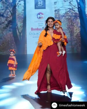 Debina Bonnerjee Instagram - Moments like this ❤️ This one is obviously the most special #iykyk 😉 
Thank you @shivanee_saraf for putting across sucha beautiful thought for @barrooni.in collection 
The thought : To be structured and messy at the same time and every “mother” will just get it since we are on a role to shine get our confident going, keep things structured and yet we are messy too haha!! 
To good times and making the best memories with my little girls❤️ 
.
Outfit both mommy babies : @barrooni.in 
👠 : @Sana.k.official
Hair : @irshad__hair 
Styled by : @simrankhera5 
Managed by : @jeevitaoberoi 
.
Thank you @timesfashionweek 
.
.
#debinabonnerjee #love #bombaytimesfashionweek