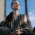 Dove Cameron Instagram - un petit garçon arrive à paris !! 👩🏻‍❤️‍💋‍👩🏻 merci @kenzo for a magical evening, @nigo impeccably fresh blend of masculin et féminin on the seine au coucher du soleil. vous êtes une source d'inspiration🌸🌸🌸 photo: @dariasenin 🩰