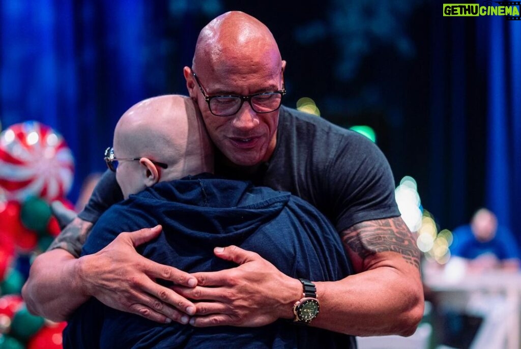 Dwayne Johnson Instagram - This is Adelaide Bomberger from @makeawishamerica. She’s 17 and awesome. Adelaide’s wish was to meet me, beat me at arm wrestling, and do our VERY special bald head touch handshake - so I can have the honor of joining her “bad ass team bald club”. She succeeded at all three 3️⃣ ☑️ 🥰 Amazing kid. I’m lucky to meet her. Stay strong Adelaide — you inspire everyone around you, including me. A lot of positive and good stuff still happening around the world, and Adelaide is one of them. #MakeAWishDay #21Kids #BestDayEver