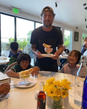 Elizabeth Chai Vasarhelyi Instagram - Welcome to the hood @robertaspizza #montauk Carlo is one of those friends whom I’ve known through many lifetimes it was amazing to fete the coolest or should I say hottest chef around - #carlomirarchi opening night in Montauk! (And intro him to @jimmychin and M&J) We enjoyed the clam pizza and more pizzas, squid, endive salad, The Uni (a la a buckwheat crepe) and of course the epic soft serve… the vibe is chill and fun but come for the food - it’s delicious. Congratulations Carlo.