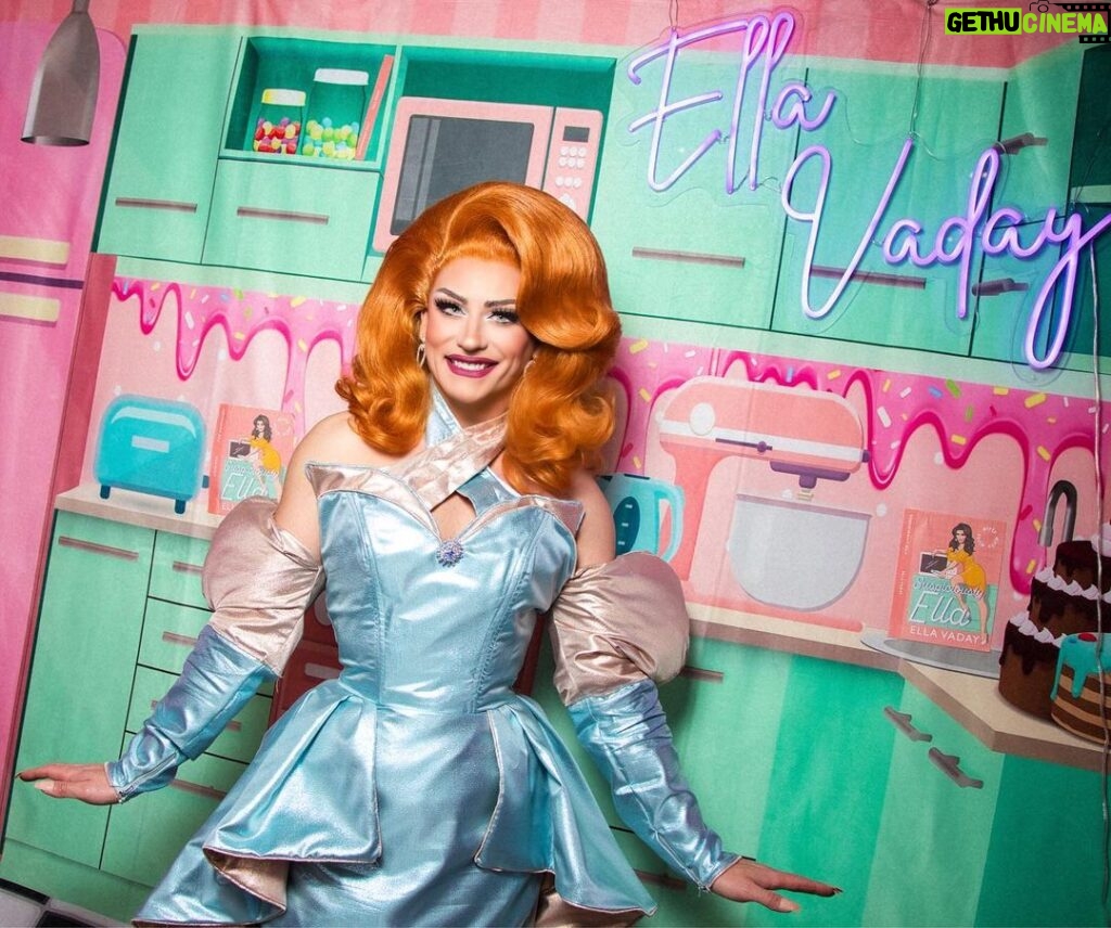 Ella Vaday Instagram - SO excited for @rupaulsdragcon LA next week! Ella Vaday In LA! This was 📸 by @dragcoven at Drag Con London back in January in my lil kitchen!! It was an incredible 3 days meeting all of you!! 💖 Not sure what my booth will look like this year as I have to source everything in LA, but can’t wait, so come on down and say hi! Also doing Bring back my girls filming on day one at 1:30pm for cheeky reunion with my sisters, even though we talk everyday anyways!!! Dress @lizziebiscuits Hair @howsyourheadwigs by @venus.nv