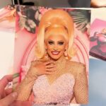Ella Vaday Instagram - @rupaulsdragcon 2024 was an absolute blast! Always love it as it gives you a chance to meet so many people that support you as well as hundreds of fellow drag racers from across the globe, there’s nothing quite like it! Thankyou all for coming to see me, I personally have a fear of my birthday for fear no one will show up, so imagine my anxiety for dragcon each time!!! Early mornings, and long days in full glam and heels, went so quickly thanks to the lovely people that came to see me. Massive thanks too to my lovely BF and @vivianbambam for helping run my booth, anyone that visited will agree they are THE BEST! ❤️ Dress @the_drag_room Hair @venus.nv , wig base @howsyourheadwigs Pic 1&2 @stunnin.mag Merch pics by @owenjamesvincent Video @laurenladuca