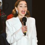 Emilia Clarke Instagram - Just what you always wanted...more photos of my GULLET! (Must learn to stop yelling so loud when being photographed/in public/in life) We only went and turned on the Covent Garden christmas lights! I have never been so ready for Christmas so early in all my life, and I ain’t complaining. (Clearly I’m just YELLING) @lastchristmasthemovie got us all in the festive mood... santa. Over to you. #ifyourehapoyandyouknowitopenyourgob #emmatmyspiritualguide #❤️ #☃️ #🤩 Not forgetting my stella glam team making me look like snoop dog himself... @earlsimms2 @kaymontano @petraflannery @chloebeeneystyling #🏆 #😍