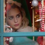 Emilia Clarke Instagram - My umbrella hasn’t left my side all day which means that summer is officially over right?! So CHRISTMAS IS ROUND THE GODDAMN CORNER BABY.... ☃️ to celebrate this here is a movie what I made @lastchristmasthemovie with my soul mates, her majesty Dame Emma Thompson (aka half of my beating heart) and his Highness @paulfeig the king of all things funny not forgetting the dream boat of all @henrygolding Ignore the beach sunsets and get that stocking ready kids... ❤️🙏🏻 #lastchristmasmovie #hohowhosgonnagetthegeorgemichaelkareokeout? #☃️