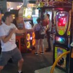 George Hardwick Instagram - This Arcade was next level, House of the dead, Initial D, Time Crisis. Wish all the Casinos were just as big but full of pure Arcade machines instead #mma #ufc #arcade #reels #gaming