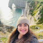 Grace Antony Instagram - Her vibe is pretty.🏔️❄️🫧 * * * * * * #france #paris #graceantony #vacation #travel #travelphotography Étretat, Normandie, France