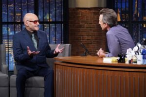 Grant Morrison Instagram - Always a great time with @sethmeyers! Thanks for having me on @latenightseth to talk about #LUDA 

Credit: Lloyd Bishop/NBC