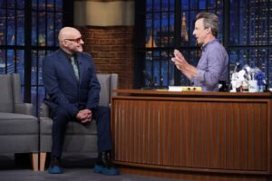 Grant Morrison Instagram - Always a great time with @sethmeyers! Thanks for having me on @latenightseth to talk about #LUDA 

Credit: Lloyd Bishop/NBC