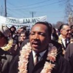 Hāwane Rios Instagram – In honor of Martin Luther King Jr Day, These are the leis made by mothers at Kawaiahaʻo Church that were sent to Dr. Martin Luther King Jr for his march to Montgomery from Selma in 1965. Dr. Martin Luther King Jr. preached at Kawaiahaʻo Church a month prior to Selma and said that Hawaiʻi was “…[an] inspiration and a noble example of racial harmony”. 

Rev Akaka and the women of Kawaiahaʻo Church made these leis for Dr. King to show their support for the Civil Rights Movement and the lei was “representing a symbol of hope and peace in the face of fear and ignorance” from the people of Hawaiʻi. 

Martin Luther King Jr. was touched by Hawai’i year when he first visited the islands years earlier in 1959. 

In an address to the state legislature, when it still met at ʻIolani Palace:

“…As I think of the struggle that we are engaged in in the South land, we look to you for inspiration and as a noble example, where you have already accomplished in the area of racial harmony and racial justice what we are struggling to accomplish in other sections of the country, and you can never know what it means to those of us caught for the moment in the tragic and often dark midnight of man’s inhumanity to man, to come to a place where we see the glowing daybreak of freedom and dignity and racial justice….”

Upon his return, he stated to his congregation:
“As I looked at all of these various faces and various colors mingled together like the waters of the sea, I could see only one face— the face of the future!” (Dexter Echo, 4 November 1959)

The first pic is that of  Rev. Abraham Akaka and his daughter with the leis. With the leis, Rev. Akaka included the following note to Dr. King: 

Dear Brother Martin Luther King – 

As you “bring good news to the meek, bind up those that are bruised, release to captives” our Prayer and Aloha reach out to enfold you.

These flower lei were made by mothers of the Kawaiaha‘o Church — for you and our brothers in the cause of our Lord Jesus whose commandment
you obey:

“Feed my lambs”

Tend my sheep

Feed my sheep”

History will honor this hour because His chosen servant was faithful and a great nation responded to that faithfulness. 

A.A.