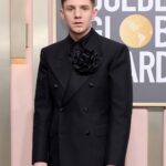 Haley Tju Instagram - @ChrisPerfetti at the Golden Globes 🖤🌸 Suit: @maisonmargiela Shirt: @blkdnm Shoes: @jb_rautureau Styled by @haleytju