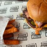 Hugh Jackman Instagram - This week’s cheat meal was one for the ages. If you’re in London, do not walk run to @gordonramsayburger. Martini, bacon cheeseburger, mac & cheese, slaw, sweet potato fries and sticky toffee pudding with ice cream. Absolute heaven. @gordongram